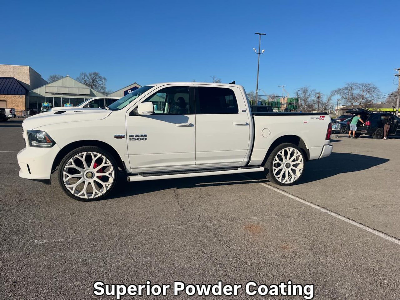Pickup truck on a fresh set of gloss-white powder coated wheels