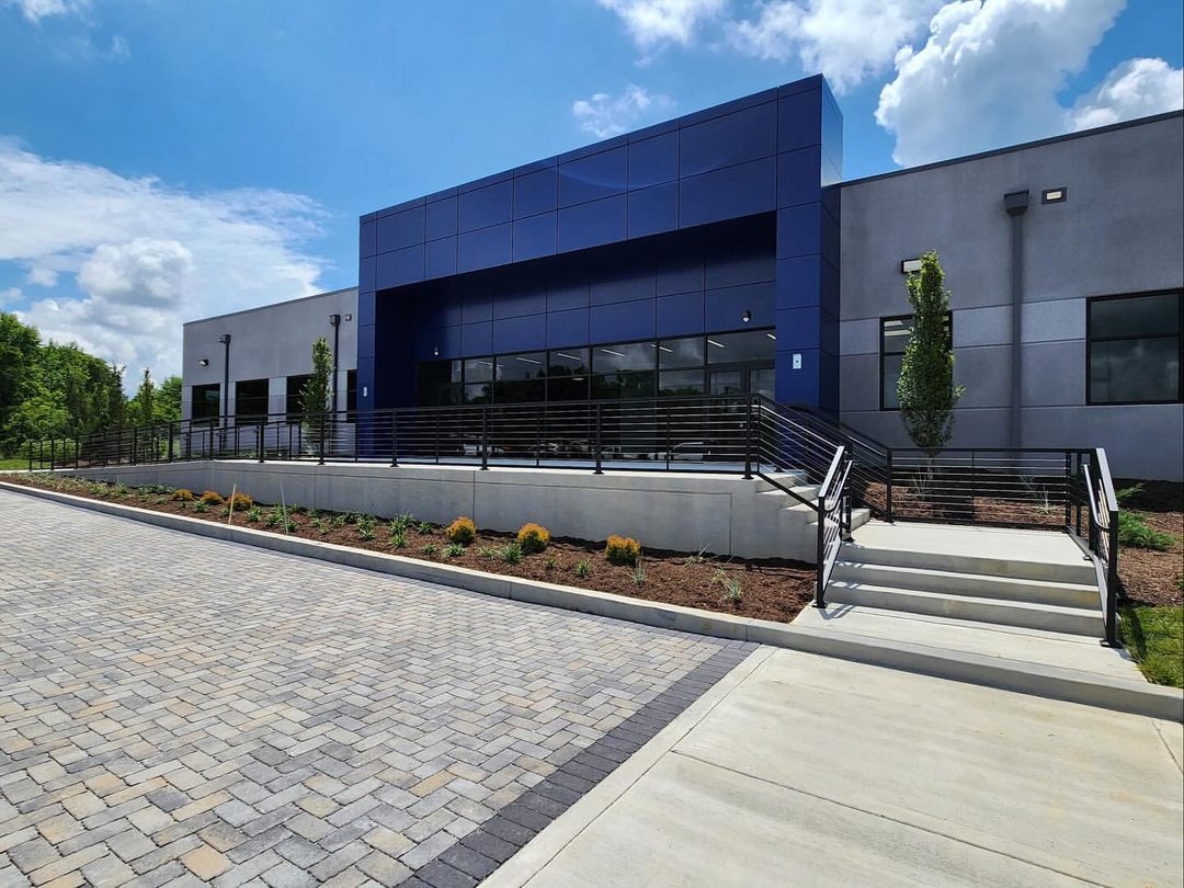 Modern commercial building with powder-coated satin-black handrails by Superior Powder Coating, Nashville